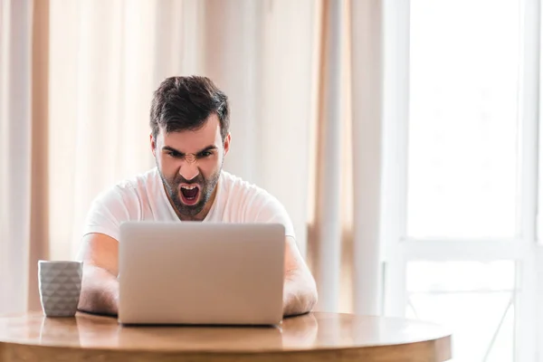 Photo of businessman who rules his company remotely like a freelancer.