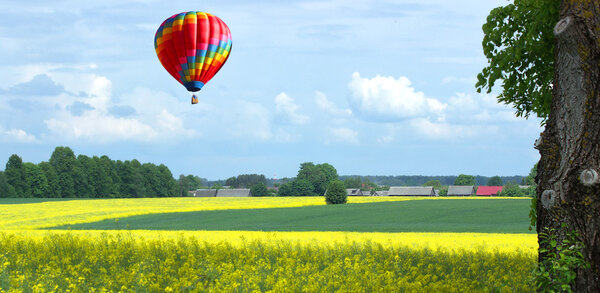 Travel balloon above fields of eastern Poland