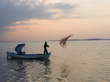 balıkçı düşünce göl günbatımı zamanı üzerinde net