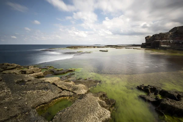 Beautiful rocks and sea with long exposure shot — Stock Photo, Image