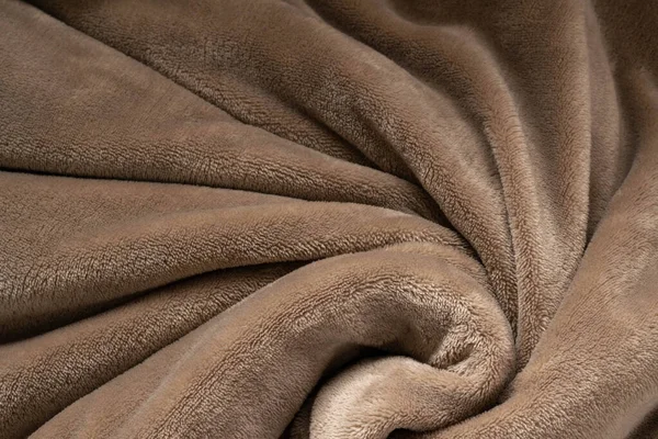 A warm blanket plush micro fleece fabric, swirled into a pattern background