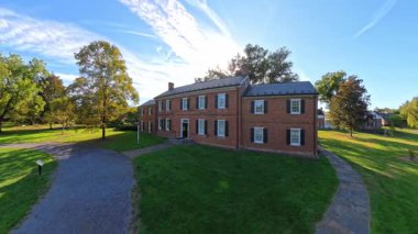 Discover the beautiful outdoor views of Shenandoah Gardens and the historic museum in Winchester, Virginia, on a sunny summer day.