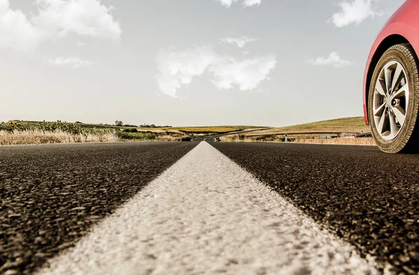 Car on the road - road line