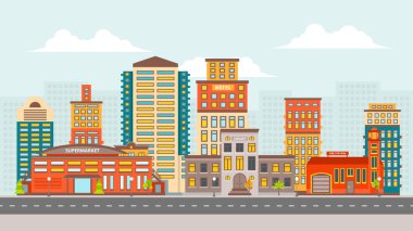 Süpermarket, itfaiye, kütüphane, otel ve konut binaları olan kentsel şehir manzarası