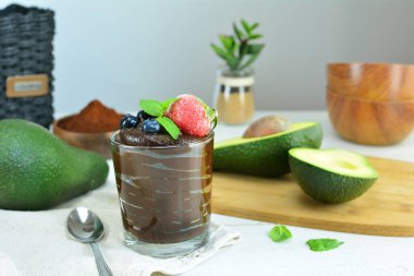Chocolate Avocado Mousse on background, close up