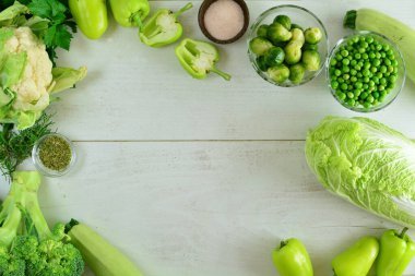 fresh vegetables on a wooden table background