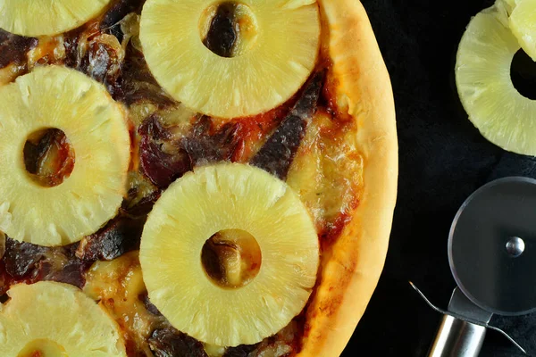 Homemade Pineapple Pizza on background, close up