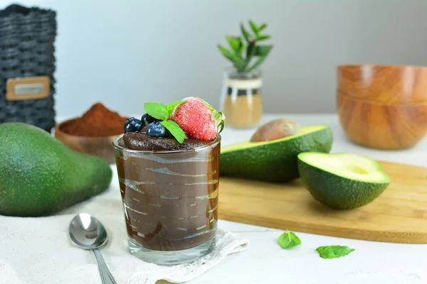 Chocolate Avocado Mousse on background, close up