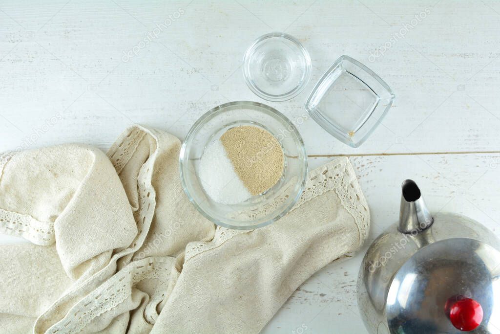 kitchen utensils and ingredients on white background