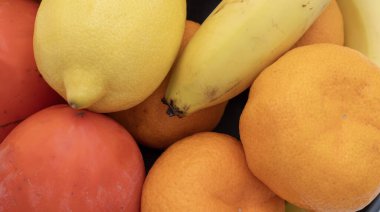 Meyve, muz, portakal, elma ve hurma bahçelerini kapayın.