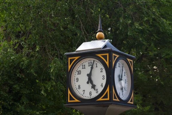 stock image City clock with solar panel