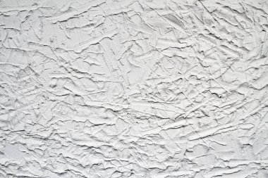 Duvarda dekoratif gri alçı etkisi. Sıva dokusu