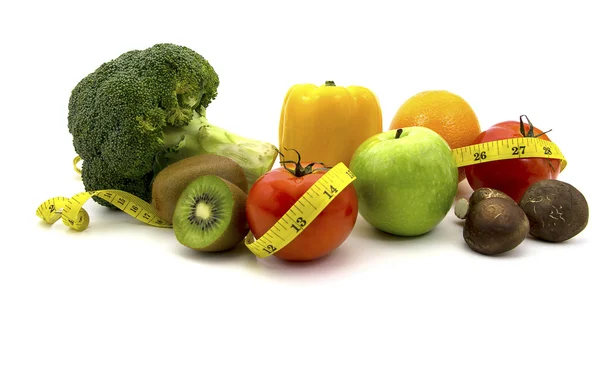 Healthy food for diet as fruit and vegetables with measurement t — Stock Photo, Image