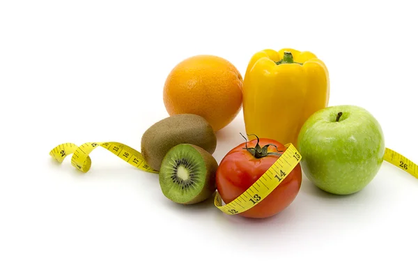 Fruits and measuring tape — Stock Photo, Image