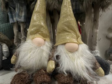 Christmas gnome is sitting. Symbol new year. Soft. Textile. Copy space. Christmas toy. High quality photo