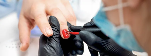 Professional Manicure Master Painting Female Nails Red Nail Polish Nail — Stock Photo, Image