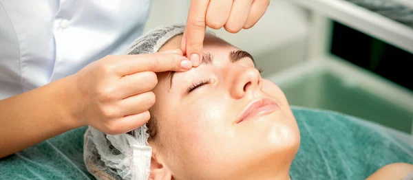 Beautician Hands Make Massage Eyebrow Woman While Facial Massage Cosmetology — Stock Photo, Image