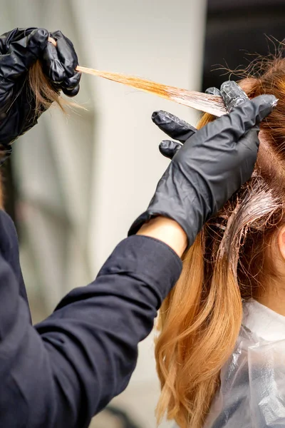 How to Grow Out Your Natural Hair Color According to Experts