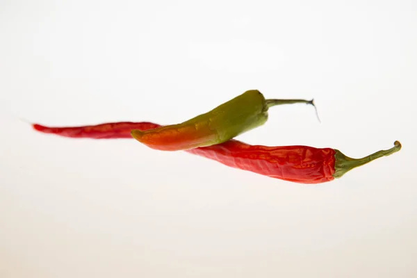 Red hot peppers on white isolated background