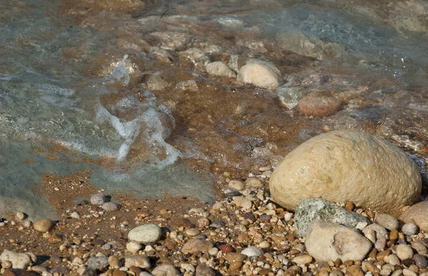 Wet stones on an ocean beach