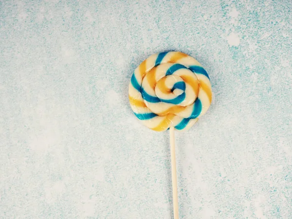 Swirly colorful lollipop candy with a nice color combination. — Stock Photo, Image