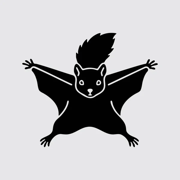 Süzülerek süzülen uçan sincabın silüeti.