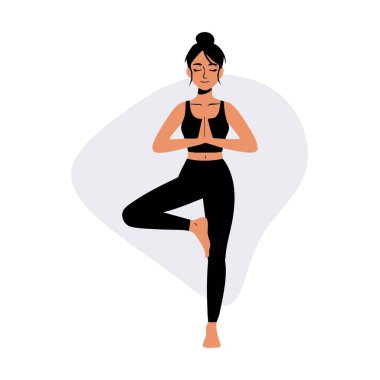 Siyah spor kıyafetli bir kadın, basit bir soyut geçmişe karşı esnek ve bilinçli olmak için diz çökmüş yoga pozu veriyor..