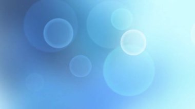 Bokeh ışıkları ve gradyan etkisi olan soyut mavi arkaplan sakin ve sakinleştirici bir atmosfer yaratıyor.