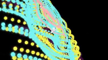 Renkli noktalar, dinamik hareketlerle birlikte karanlık bir arkaplan karşısında hareketli desenler oluşturarak büyüleyici bir görsel ekran oluştururlar..