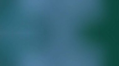 Yumuşak bulanık mavi ve yeşil eğimli mezar geçişleri huzur verici ve barışçıl tasarım estetiği için soyut arka planlar yaratıyor.