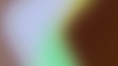 Yumuşak, bulanık renkte pastel yeşil, sarı ve kahverengi renkler koyu renkli soyut bir arka plan yaratıyor..