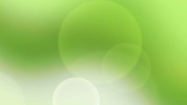 Yumuşak yeşil eğimli arka plan ve Bokeh rahatlatıcı bir atmosfer, ince bulanık daireler ve nazik renk geçişleri yaratıyor..