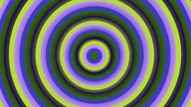 Çok renkli eşmerkezli daireler göz kamaştırıcı bir görsel illüzyon yaratıyor. Canlı mavi, yeşil ve mor renkler birlikte dönüyor..