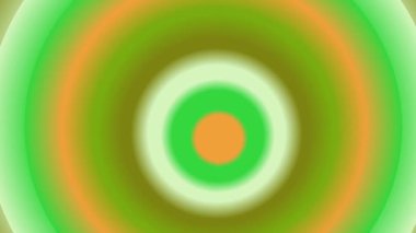 Yumuşak bulanık yeşil ve turuncu eşmerkezli çemberler modern tasarım elementi ile dinamik ve soyut bir arkaplan oluşturuyor.