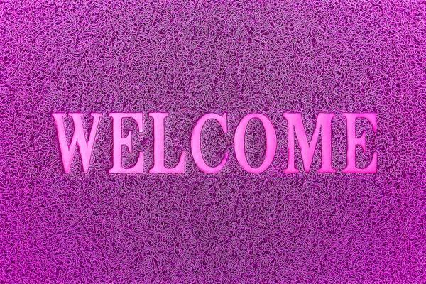 Esteira de porta roxa bem-vinda. Bem-vindo Tapete de fundo. Bem-vindo sinal roxo . — Fotografia de Stock