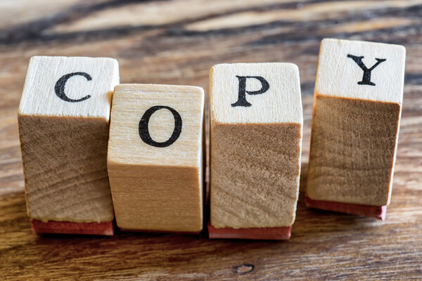 Копировать печать на фоновом изображении Водена. Копировать слова в деревянных блоках
.