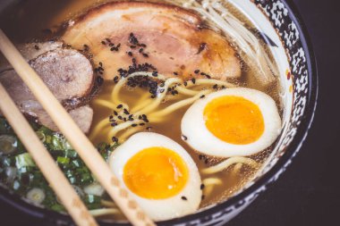 Japanese Traditional Ramen Soup with Pork, Eggs and Homemade Udon Noodles