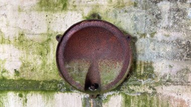 Countryside landscape near Milquhanzie Hill in Perth and Kinross Scotland showing ridge summit with masts, walking paths, and nearby ancient standing stones.