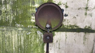 Countryside landscape near Milquhanzie Hill in Perth and Kinross Scotland showing ridge summit with masts, walking paths, and nearby ancient standing stones.
