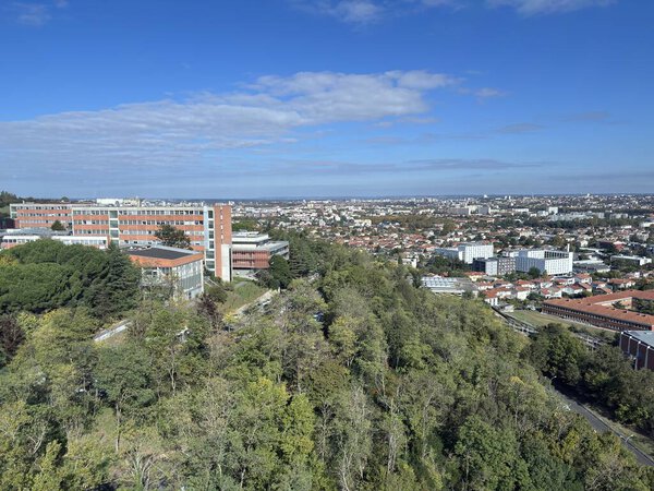 Teleo urban cable car in Toulouse France operating as longest aerial tramway in country linking Oncopole cancer research Rangueil Hospital and Paul Sabatier University with daily service.