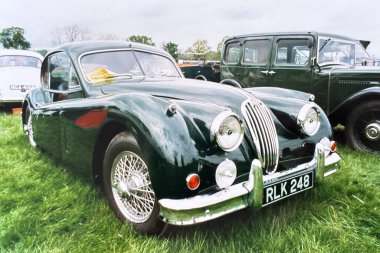 1990 'larda İskoçya' daki araba fuarında klasik araçlar ve otomotiv geçmişi sergilenen klasik arabalar.