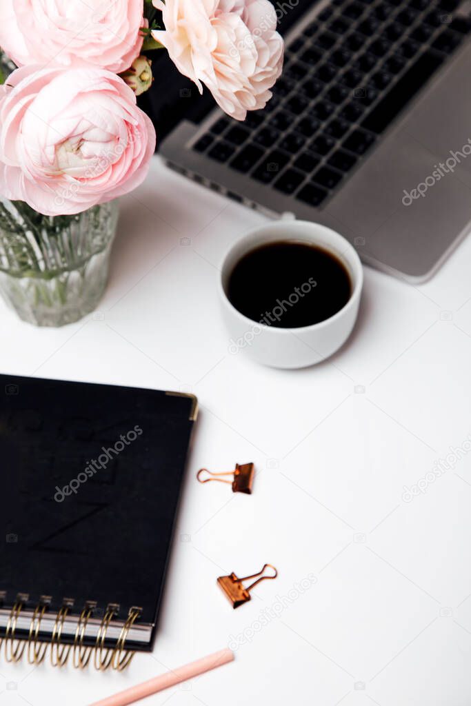 flay lay concept background with coffee, flowers and laptop