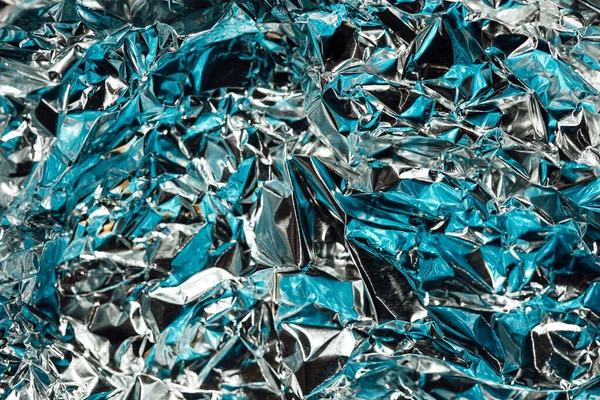 Parlak holografik folyo arka plan, çok renkli ve pastel modada