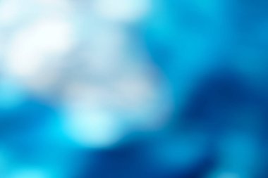 Okyanus ışığı, vektör sanatı, yumuşak bokeh dalgaları ve parlak dokuları olan soyut mavi arkaplan