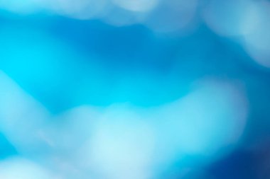 Okyanus ışığı, vektör sanatı, yumuşak bokeh dalgaları ve parlak dokuları olan soyut mavi arkaplan