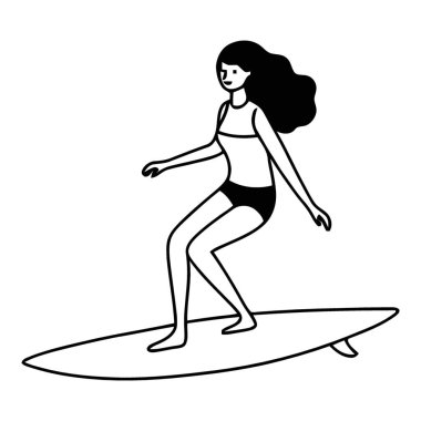 Dinamik kadın sörfçü yazın sörf tahtasında dalgalanır.