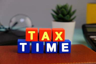 Notification of the need to file tax returns, tax form at accountant workplace. TAX TIME