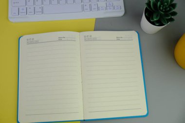 blank paper next to school tools with no word as a template for text space concept. business and education concept