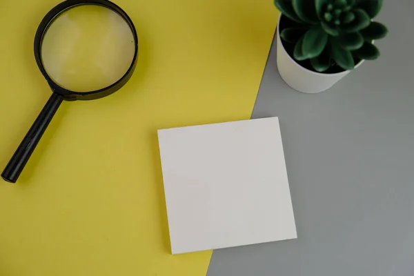 blank paper next to school tools with no word as a template for text space concept. business and education concept