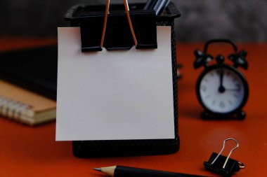 blank paper with template and office tools with no word as a template for text space concept. business concept, brown background